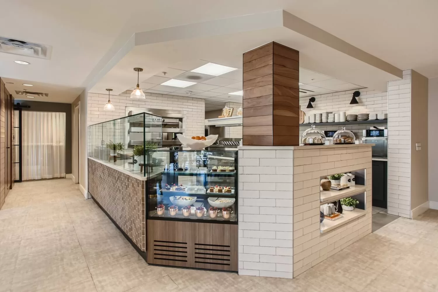 Modern senior kitchen with glass display and bright lighting