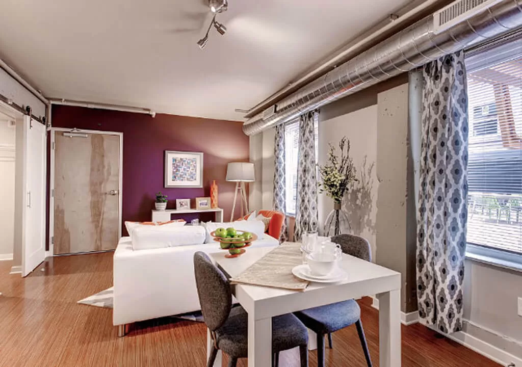 Spacious senior living room with modern furnishings and natural light