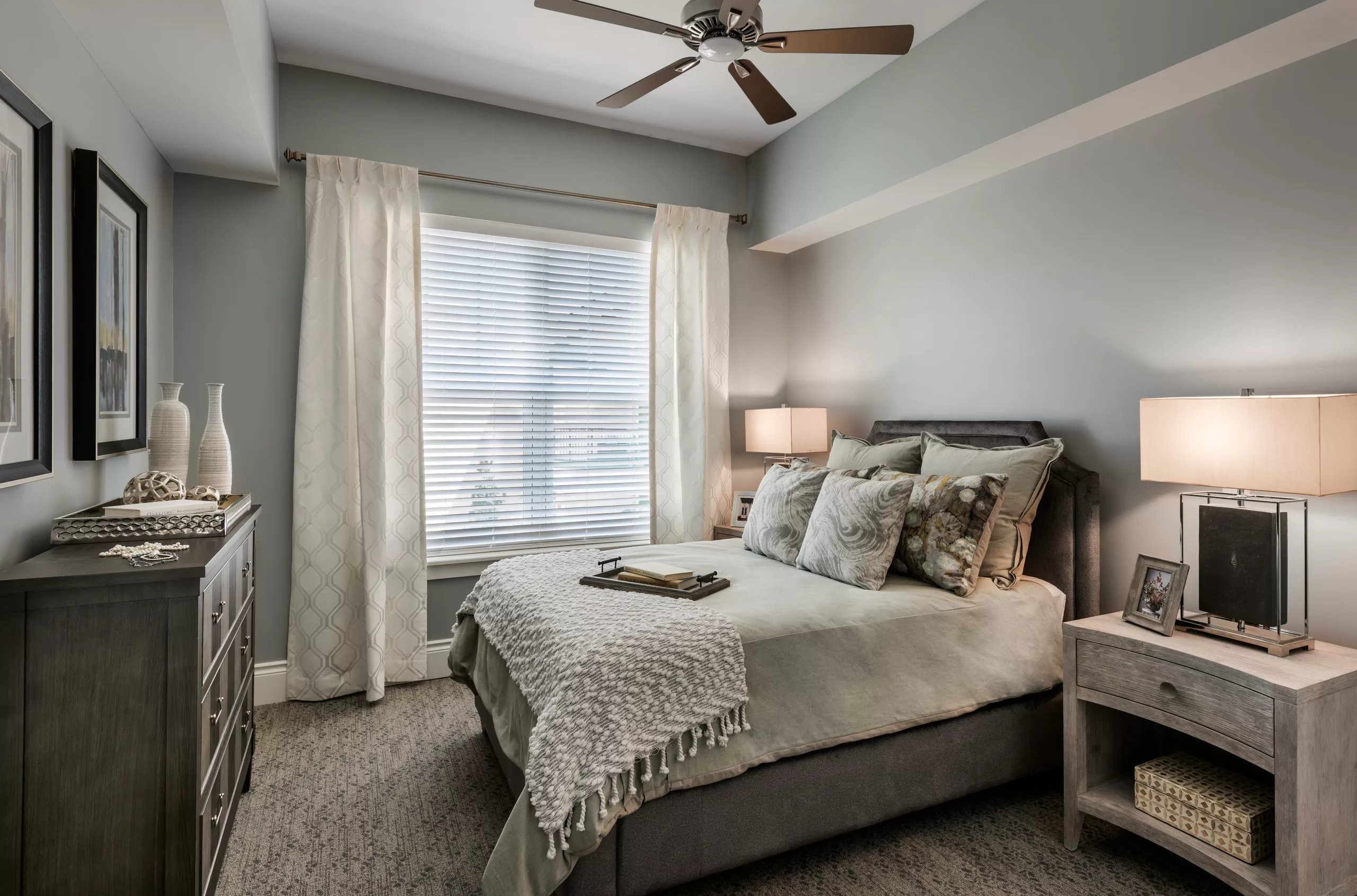 Peaceful senior bedroom with soft lighting and neutral tones